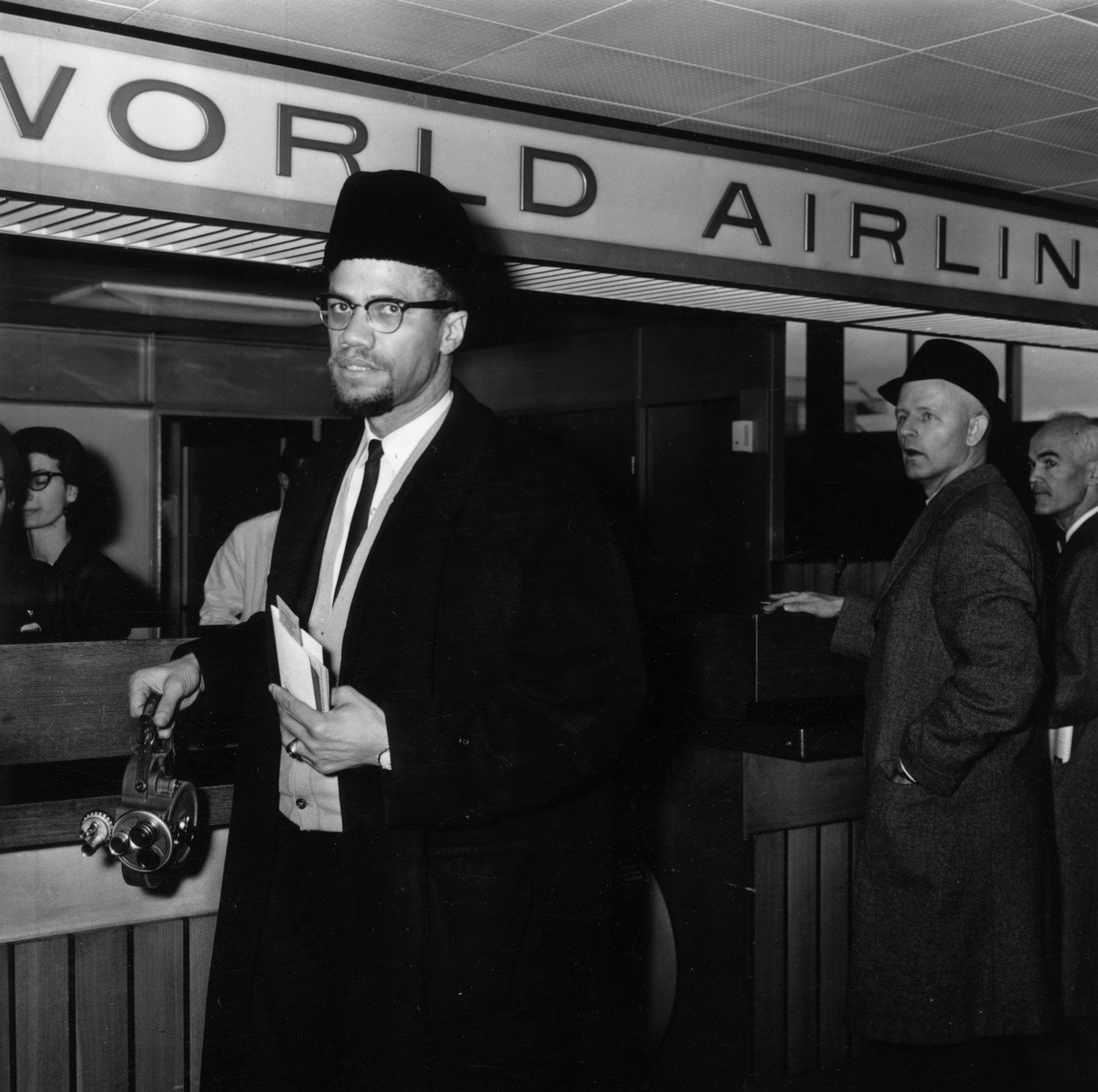 Malcolm X at London Airport, February 1965. (<a href="http://www.gettyimages.com/license/3395761">Hulton Archive</a>/Getty Images)